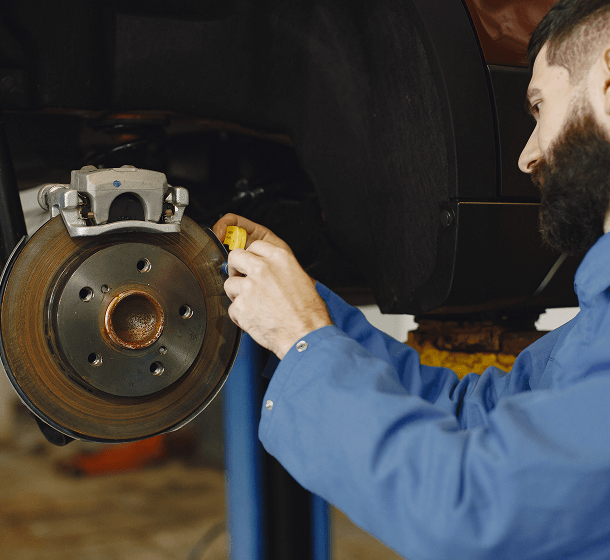 mechanic-pouring-oil-into-car-engine