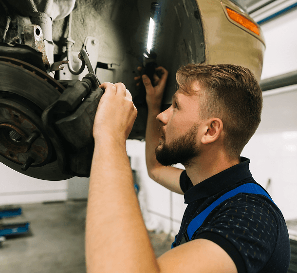 mechanic-pouring-oil-into-car-engine
